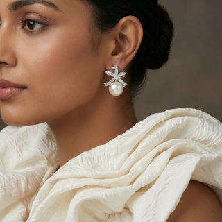 Pearl Bow Studs In Silver